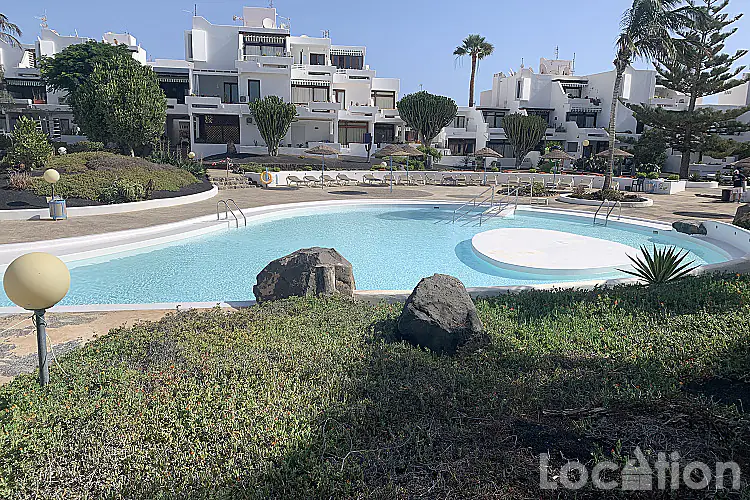 Los Molinos pool imagen por esta planta baja Apartamento en Costa Teguise